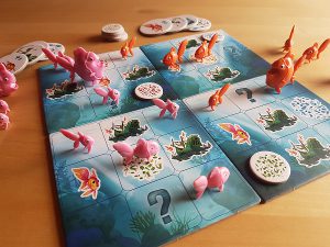 Bild: Spielfeld mit Spielfiguren und Spielchips