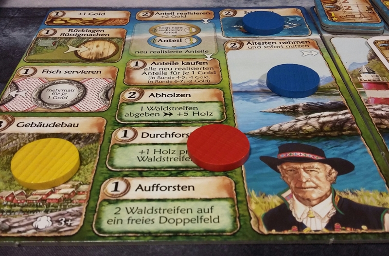 Bild: Spielkärtchen und bunte Spielsteine