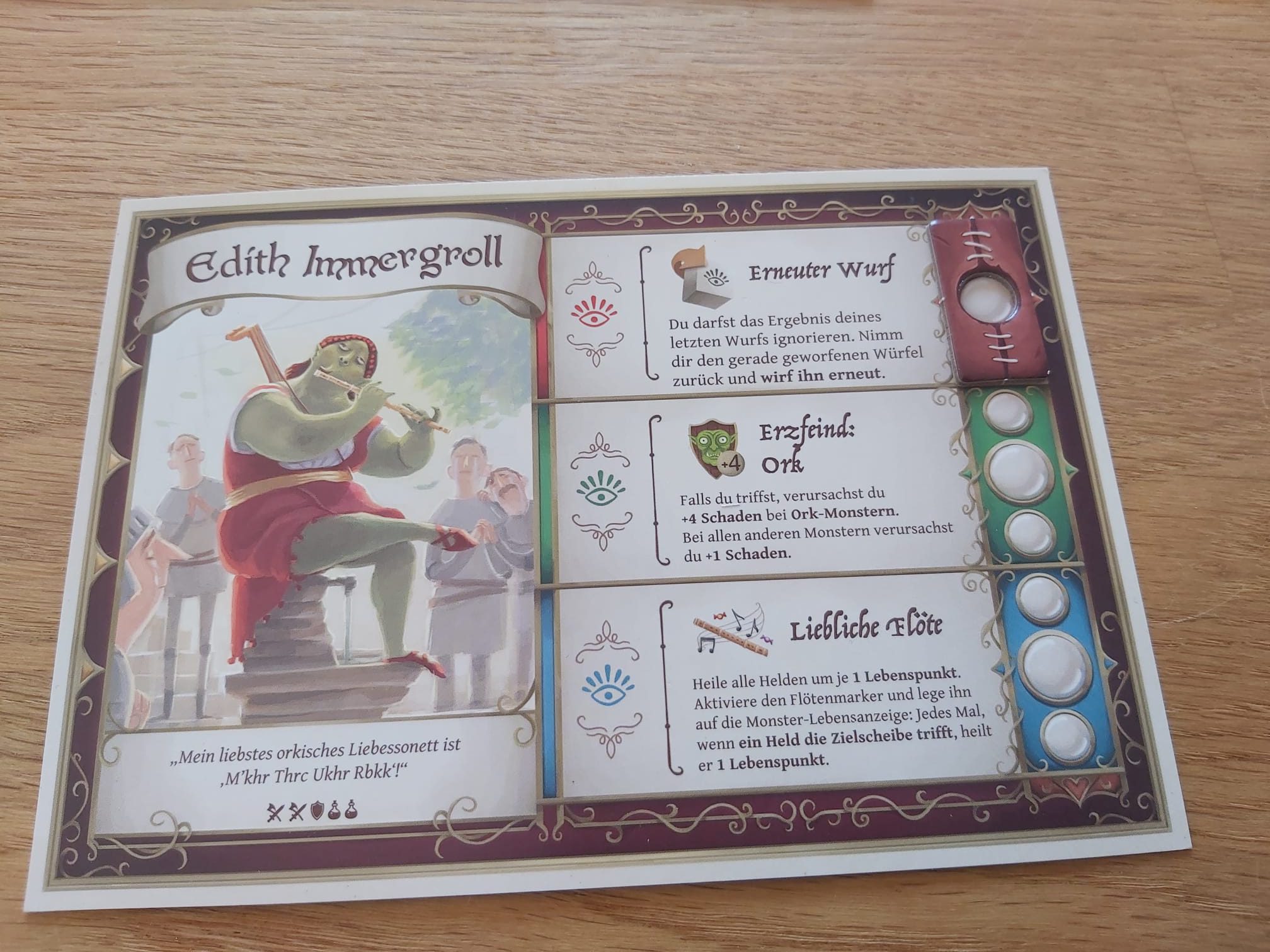 Zu sehen ist ein Charaktertableau mit einer Narbe.