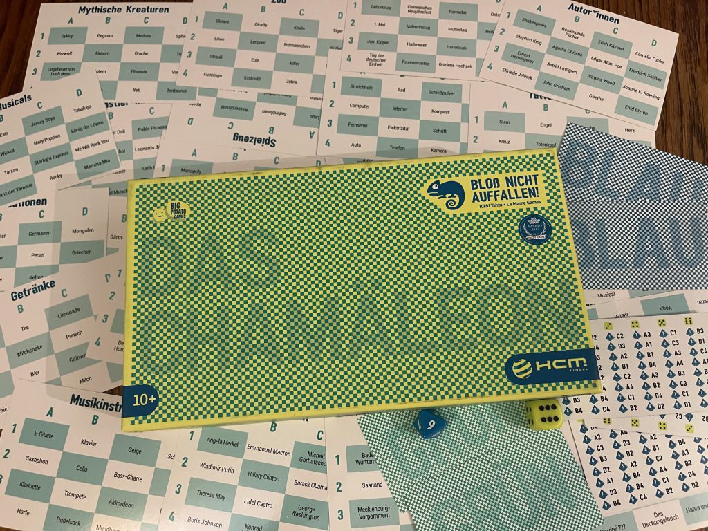 Auf dem Bild ist der Spielkarton mit dem Spielmaterial abgebildet. 