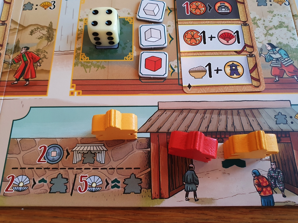 Einsatzfeld für Würfel, darunter das Einsatzfeld für die Höflinge