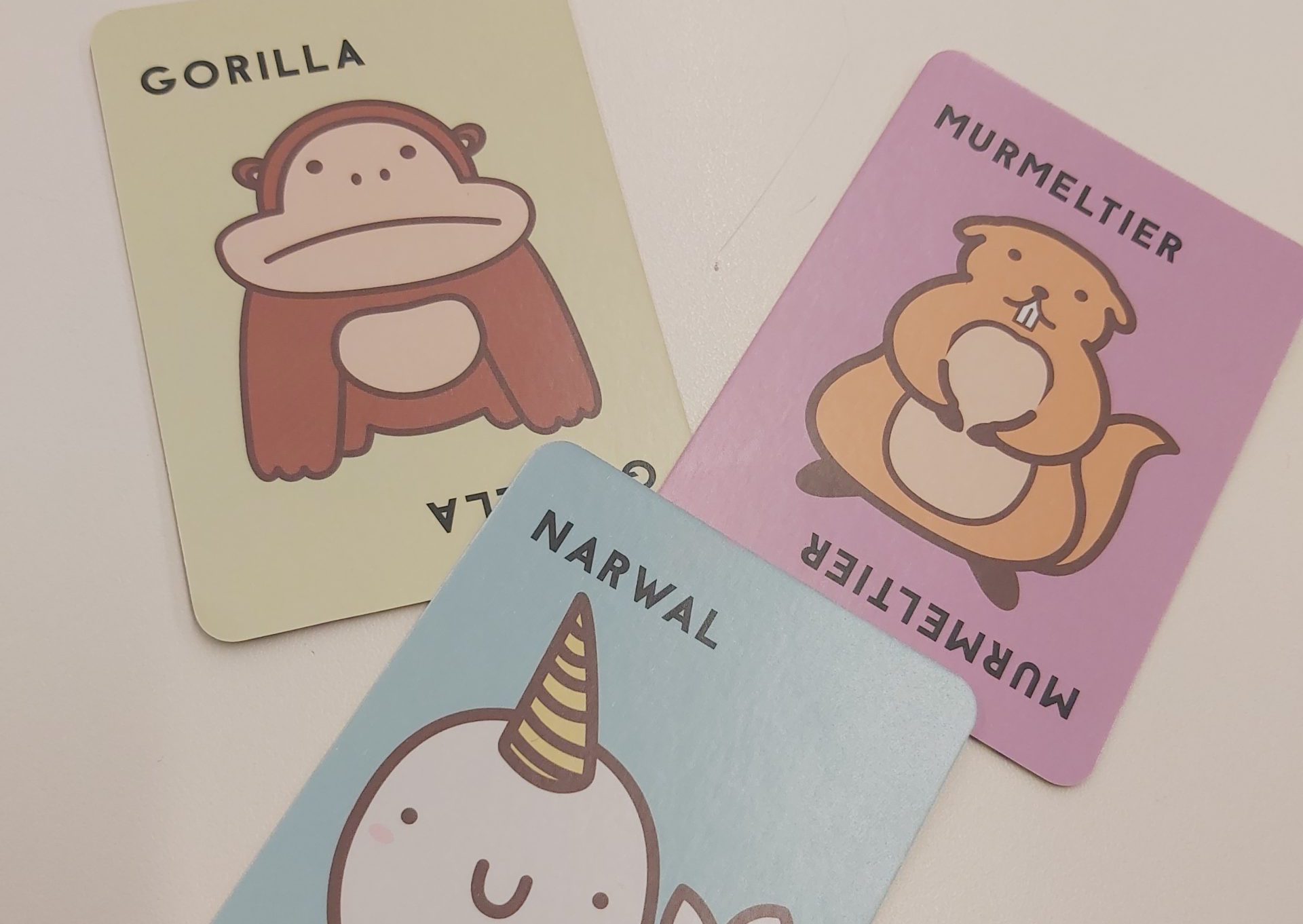 Zu sehen sind die drei Sonderkarten des Spiel Taco - Katze - Ziege - Käse - Pizza