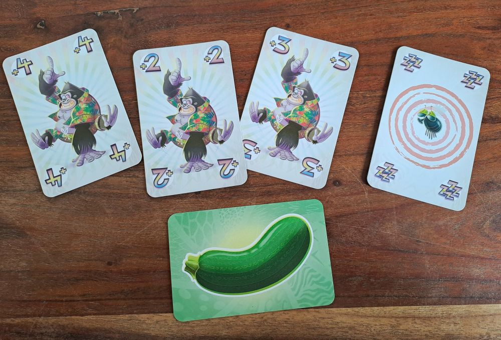 Zu sehen sind die Sonderkarten Zucchini, Gorilla und Fliege.