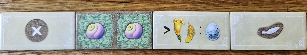 Beispiele für Bonusplättchen.