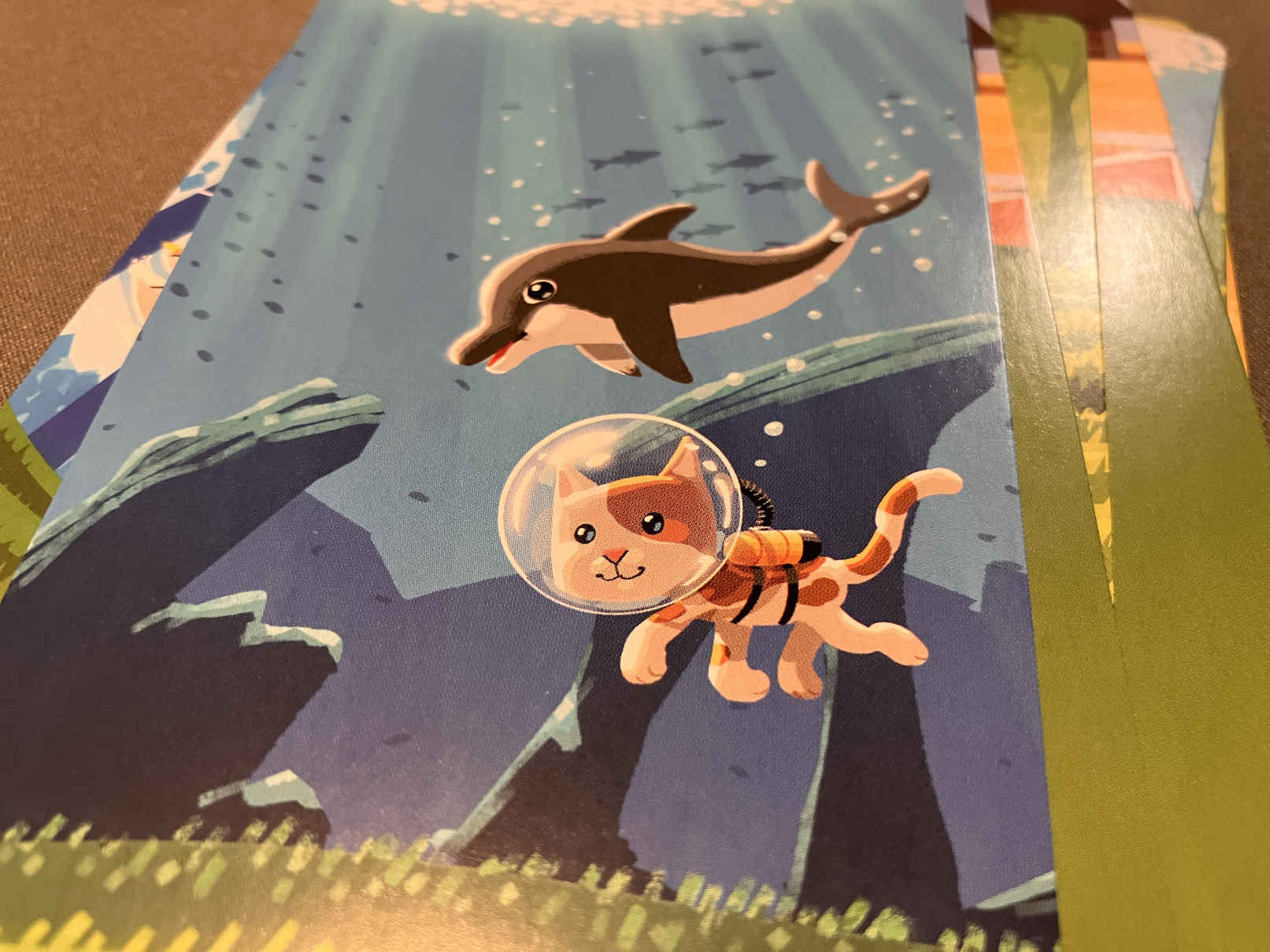 Die Karten sind toll illustriert - die Katze taucht hier in der Wasserwelt mit.