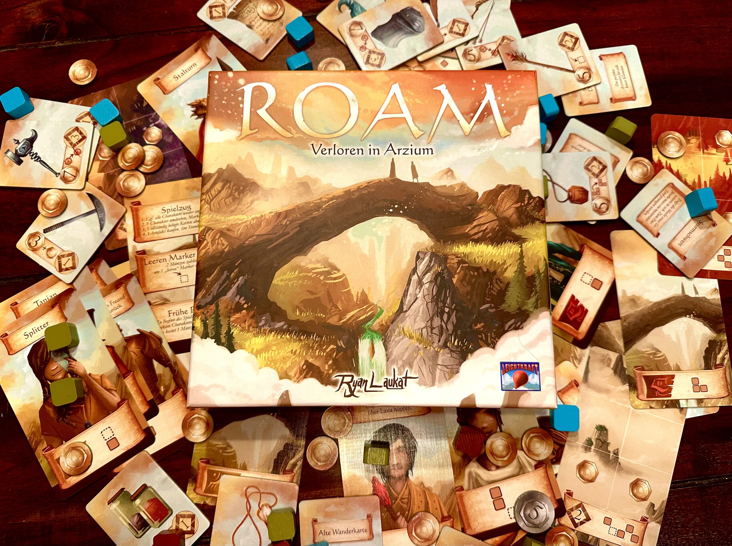 Spielaufbau mit 3×2 Kartenraster und Markerhaufen